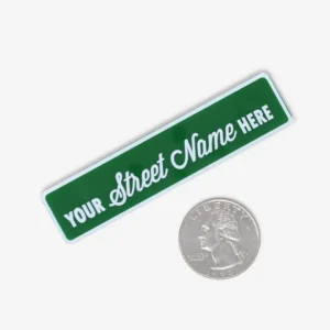 Custom-printed 1:12 scale street sign, perfect for dioramas, dollhouses, and miniature displays with personalized designs for collectors and hobbyists